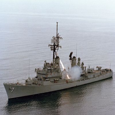 Home Comforts An aerial port bow view of the guided missile destroyer USS Henry B. Wilson (DDG-7) firing an RUR-5A