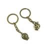 100 Pieces Antique Bronze Keychain Key Chain Tags Keyring Ring Jewelry Making Charms Supplies KC1031 Hollow Skull view 1