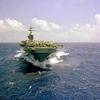 A bow view of the nuclear-powered aircraft carrier USS Dwight D Eisenhower Poster Print by Stocktrek Images (34 x 22) view 1