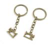 100 Items Keychain Keyring Key Tags Chains Rings Jewelry Bag Charms P4DA8 Sewing Machine view 1