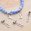 Aylifu 26pcs Letter Charms Alphabet A - Z Letter Charm Pendants with Bail Beads for Necklace Bracelets Jewelry Making,Silver view 4