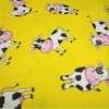 Cows- Tossed on Yellow Fabtic by the yard view 2