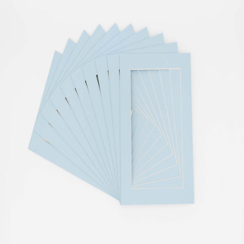 CountryArtHouse 11x14 Precut Picture Frame Mats, White Core Bevel Cut, Acid Free 4-Ply Mat Board Fits 8x10 Photos, Professional Photo Mat Inserts for Frames & Gallery Wall, Baby Blue, Pack of 100