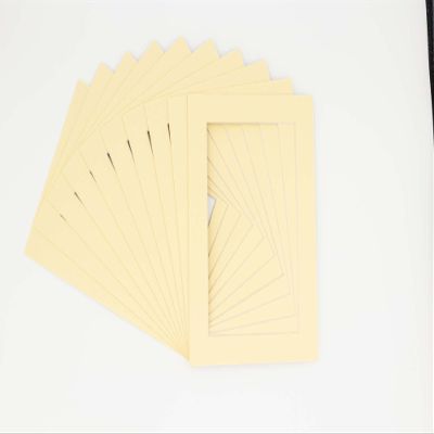 CountryArtHouse Soft Yellow Acid Free 12x16 Picture Frame Mats with White Core Bevel Cut for 11x14 Pictures - Fits 12x16 Frame - Pack of 100 Mats