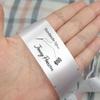 100pcs Custom Logo Sewing tag Personalized Name Fabric Clothing Label DIY Handmade Gift Needle and Thread Pattern White Silky Satin Flat sew in end fold Washable Label view 2