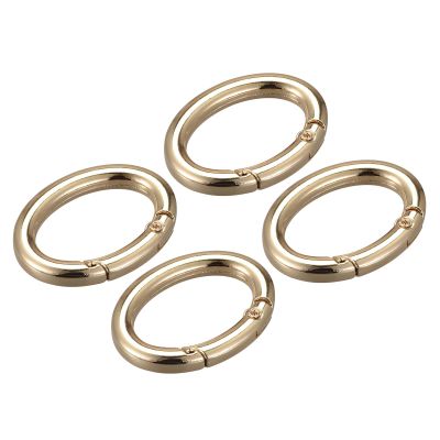 uxcell Spring Oval Ring, 4Pcs 1.85 Inch Round Spring Snap Clip Trigger Spring Keyring Buckle for Bags Purses Keychain, Gold Tone
