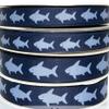 3 yds 3/8" or 5/8" or 7/8" Gray Sharks on Navy Blue Grosgrain Ribbon (7/8") view 1