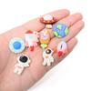 Honbay 24PCS Space Theme Flatback Resin Charms Cute Astronaut Rocket Planet Spaceship Resin Cabochons Ornaments for Hair Accessories Phone Case Scrapbooking Decor (8 Style) view 4
