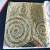 JINRUISI Variegated Gold Foil Leaf 50 Sheets Booklet Colorful Imitation Gold Leaf Gilding Craft Decoration Art (Spiral Lucky Clouds Gold) view 1