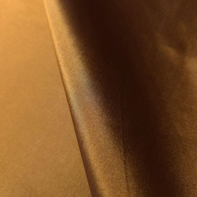 Muse Fabric Iridescent Polyester Taffeta Fabric - Bronze Gold with Black Undertones - 58 Inch by The Yard Wide for Drapery and Formal Wear