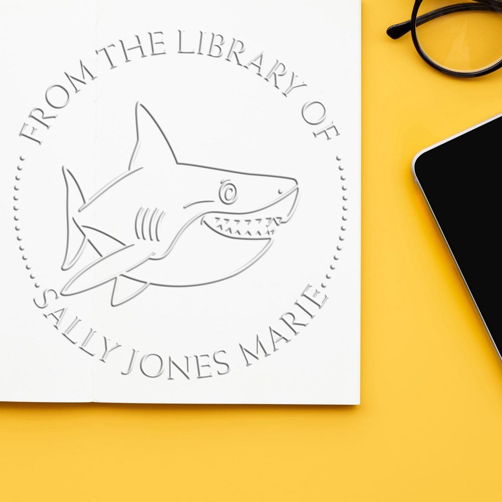Custom Library Embossing Stamp - Personalized Book Name Embosser with Soft Swift Shark Design - 'This Book Belongs to' Paper Embosser - Available in Red, Blue, Grey, or Pink Handle - 1-5/8 Size