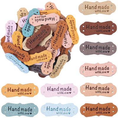 CALFOVERA 60Pcs PU Leather Tags for Crochet 10 Colors Handmade with Love Embossed Labels Microfiber Leather Crochet Tags with Hole for Valentine's Day Gift Making DIY Jeans Bags Shoes Crafts Sewing